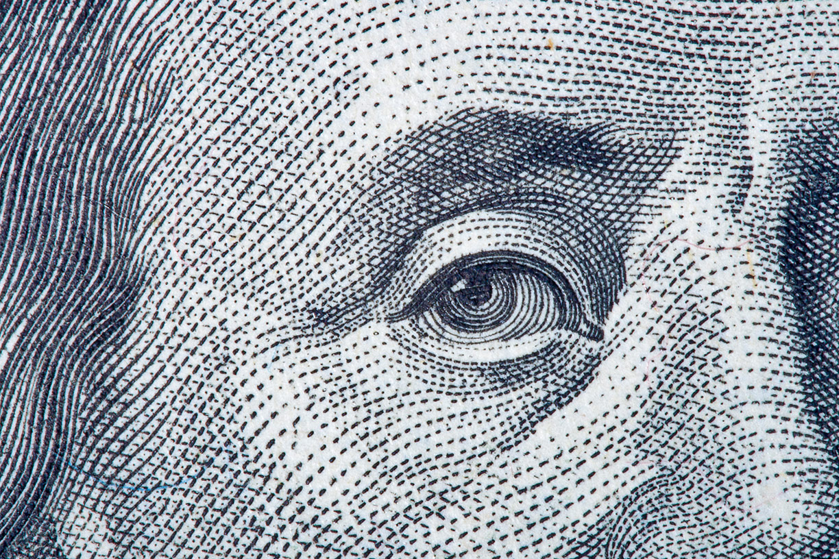 Closeup of Benjamin Franklin on money